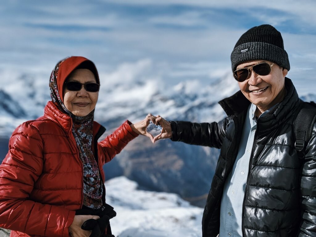 Parents heart shape hands on Gornergrat, Switzerland